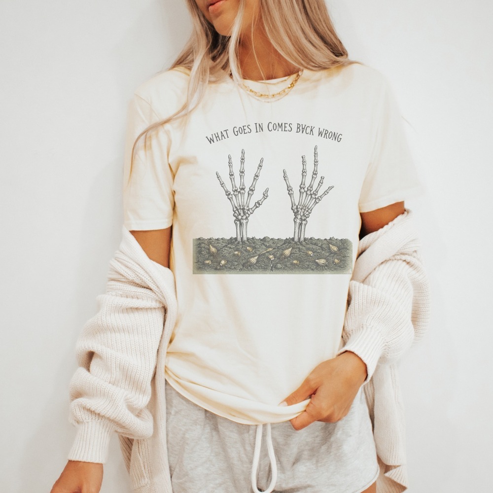 Skeletal Hands Emerging from Soil Graphic Tee